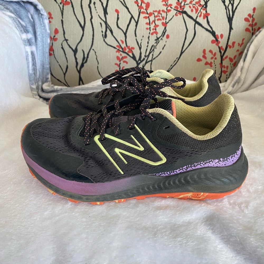 New Balance Black and Purple Sneakers with Orange Accents